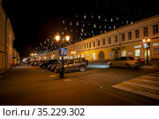 Вечерний, предпраздничный городской пейзаж. Московская улица - центральная улица города. Муром. Владимирская область (2020 год). Редакционное фото, фотограф Сергей Афанасьев / Фотобанк Лори