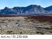 Huge mountains of Teno massif around valley with TF-21 road. Crossroad with turn to Teleferico Cable car. Teide, Tenerife, Canary islands, Spain (2016 год). Стоковое фото, фотограф Кекяляйнен Андрей / Фотобанк Лори