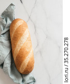 British White Bloomer or Baton loaf bread. Стоковое фото, фотограф Ольга Сергеева / Фотобанк Лори