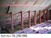 wall insulation with glass wool. Стоковое фото, фотограф Типляшина Евгения / Фотобанк Лори