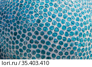 Blue glass pebbles cemented on a spherical surface. Стоковое фото, фотограф Юрий Бизгаймер / Фотобанк Лори