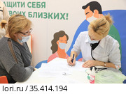 Прием врача перед вакцинацией. Стоковое фото, фотограф Кристина Викулова / Фотобанк Лори