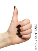 Female hands with black nails manicure with thumb up isolated on white background. Стоковое фото, фотограф Сергей Пристяжнюк (Serg Zastavkin) / Фотобанк Лори
