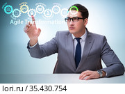 Businessman in agile transformation concept. Стоковое фото, фотограф Elnur / Фотобанк Лори