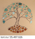 Transitory art arrangement - tree drawn on craft paper and and assortment of seaglass collected on beaches of Gran Canaria, representing seasonal change. Стоковая иллюстрация, иллюстратор Tamara Kulikova / Фотобанк Лори