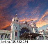Belorusskiy railway station (written in Russian)-- is one of the nine main railway stations in Moscow, Russia. It was opened in 1870 and rebuilt in its current form in 1907-1912 (2016 год). Редакционное фото, фотограф Владимир Журавлев / Фотобанк Лори