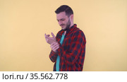 Man holding his wrist and suffering pain in hand. Стоковое видео, видеограф Mihail Mihaylov / Фотобанк Лори