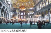 View of central nave and main dome decorated with ancient frescoes and mosaics in Ayasofya Mosque (2020 год). Редакционное видео, видеограф Яков Филимонов / Фотобанк Лори