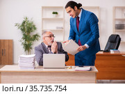 Two employees working in the office. Стоковое фото, фотограф Elnur / Фотобанк Лори