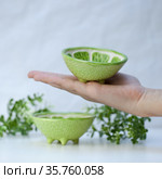 Ceramic cup in the form of half a lime (2021 год). Редакционное фото, фотограф Эльвира Рахманова / Фотобанк Лори