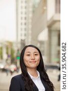 Young Businesswoman  Looking at Camera. Стоковое фото, агентство Ingram Publishing / Фотобанк Лори