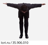Businessman Bowing Low. Стоковое фото, агентство Ingram Publishing / Фотобанк Лори