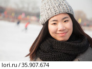 Young woman ice skating portrait, Beijing. Стоковое фото, агентство Ingram Publishing / Фотобанк Лори