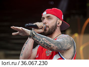 Российский рэп-исполнитель ST Александр Андреевич Степанов выступает на сцене гала-концерт, посвященного Дню России, 12 июня 2021. Редакционное фото, фотограф Николай Винокуров / Фотобанк Лори