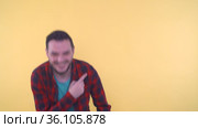 Happy man laughing feeling excited pointing finger at copyspace. Стоковое видео, видеограф Mihail Mihaylov / Фотобанк Лори