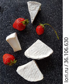 Camembert on black background. Стоковое фото, фотограф Марина Володько / Фотобанк Лори