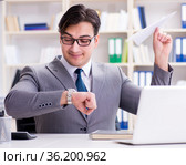 Businessman with paper airplane in office. Стоковое фото, фотограф Elnur / Фотобанк Лори