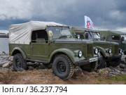 Советские полноприводные автомобили ГАЗ-69 на международном форуме ретро транспорта "Фортуна". Кронштадт (2016 год). Редакционное фото, фотограф Виктор Карасев / Фотобанк Лори
