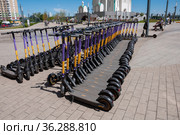 Krasnogorsk, Russia - July 22. 2021 Short-term rental service for electric scooters Urent (2000 год). Редакционное фото, фотограф Володина Ольга / Фотобанк Лори