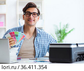 Young designer choosing colours for new project. Стоковое фото, фотограф Elnur / Фотобанк Лори