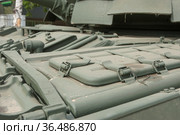 Передняя левая часть корпуса российского основного газотурбинного танка Т-80У-Е1 на полигоне "Алабино" в парке "Патриот", Международный военно-технический форум "Армия-2019", фрагмент. Редакционное фото, фотограф Малышев Андрей / Фотобанк Лори