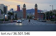 Picturesque cityscape in summer evening overlooking lighted avenue Avinguda de la Reina Maria Cristina with two Venetian Towers at junction with Placa dEspanya (2021 год). Редакционное видео, видеограф Яков Филимонов / Фотобанк Лори