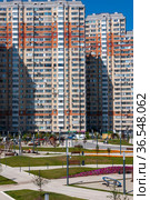 Krasnogorsk, Russia - July 22. 2021. Walking area with a children's playground on the embankment (2000 год). Редакционное фото, фотограф Володина Ольга / Фотобанк Лори