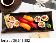 Set of different sushi - makis, uramaki and nigiris. Стоковое фото, фотограф Яков Филимонов / Фотобанк Лори