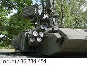 Правая часть дымовой системы "Туча" нового российского основного танка Т-90А, полигон "Алабино" в парке "Патриот", Международный военно-технический форум "Армия-2019" Редакционное фото, фотограф Малышев Андрей / Фотобанк Лори
