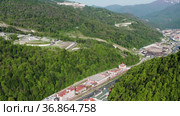 Северный Кавказ. Роза Хутор и Эсто-Садок. Вид с воздуха. North Caucasus. Rosa Khutor and Esto sadok. Aerial view. (2021 год). Стоковое видео, видеограф Евгений Романов / Фотобанк Лори
