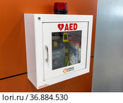 Larnaca, Cyprus - Nov 12. 2019. Box of Automated External Defibrillator AED, cardiac science. Редакционное фото, фотограф Володина Ольга / Фотобанк Лори