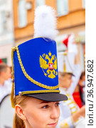 Russia, Samara, July 2019: a beautiful girl in a hussar costume on Kuibyshev street at the carnival dedicated to the World Cup. Редакционное фото, фотограф Акиньшин Владимир / Фотобанк Лори