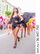 Russia, Samara, July 2019: processions of beautiful dressed up girls on Kuibyshev street at the carnival dedicated to the World Cup. Редакционное фото, фотограф Акиньшин Владимир / Фотобанк Лори