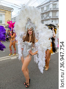 Russia, Samara, July 2019: processions of beautiful dressed up girls on Kuibyshev street at the carnival dedicated to the World Cup. Редакционное фото, фотограф Акиньшин Владимир / Фотобанк Лори