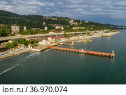 Черноморское побережье. Хоста - район города-курорта Сочи. Вид с воздуха. Black Sea coast, cape Vidny. Khosta - a district of the resort city of Sochi. Aerial view. (2021 год). Стоковое фото, фотограф Евгений Романов / Фотобанк Лори