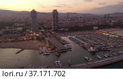 Drone view of the evening Barcelona, the capital of Catalonia, on the Mediterranean coast, Spain. Стоковое видео, видеограф Яков Филимонов / Фотобанк Лори