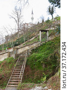 Old empty stairway goes up to the Mosque (2021 год). Стоковое фото, фотограф EugeneSergeev / Фотобанк Лори