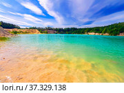beautiful turquoise color of water in a kaolin quarry near the city of Kyshtym, Chelyabinsk region in Russia. Стоковое фото, фотограф Акиньшин Владимир / Фотобанк Лори