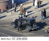Съемочная группа фильма "Сын отца народов". Васильевский спуск. Город Москва (2013 год). Редакционное фото, фотограф lana1501 / Фотобанк Лори