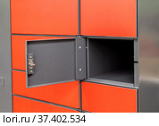 Empty cell postamat with an open door. Стоковое фото, фотограф Володина Ольга / Фотобанк Лори