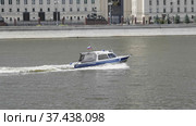 MOSCOW - MAY 7: Boat police of Russia floating on the Moscow river on May 7, 2017 in Moscow, Russia. Стоковое фото, фотограф Фотограф / Фотобанк Лори