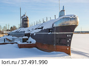 VYTEGRA, RUSSIA - FEBRUARY 23, 2021: Soviet submarine B-440 close-up on a sunny February day. Museum in the city of Vytegra. Редакционное фото, фотограф Виктор Карасев / Фотобанк Лори