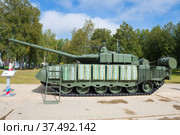 ALABINO, RUSSIA - AUGUST 25, 2020: Russian tank of T-80BVM with improved combat characteristics on the international military-technical forum "Army 2020". Profile View. Редакционное фото, фотограф Виктор Карасев / Фотобанк Лори