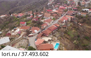 Aerial view of the small tourist town of Sighnaghi, located on a high hill in the center of the Alazani Valley, Georgia. Стоковое видео, видеограф Яков Филимонов / Фотобанк Лори