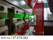 Modern laser precision CNC cutting machine. (2012 год). Редакционное фото, фотограф Alexey Rezvykh / Фотобанк Лори