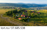 Южный Урал, Башкортостан, село Кага. Вид с воздуха. Southern Urals, Bashkortostan, Kaga village. Aerial view (2020 год). Стоковое фото, фотограф Евгений Романов / Фотобанк Лори