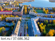 Aerial view on the movement of cars on the ring road. Top view of the city and car junctions. Стоковое фото, фотограф Евгений Ткачёв / Фотобанк Лори