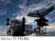 Air defense radars of military mobile anti aircraft systems, modern army industry on background beautiful clouds and sky, Russia. Стоковое фото, фотограф Владимир Журавлев / Фотобанк Лори