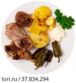 Roasted lamb leg served with grilled organic vegetable and peppe closeup. Стоковое фото, фотограф Яков Филимонов / Фотобанк Лори