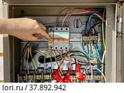 Consumer unit switchboard with fuse box circuit breakers. Стоковое фото, фотограф Владимир Григорьев / Фотобанк Лори